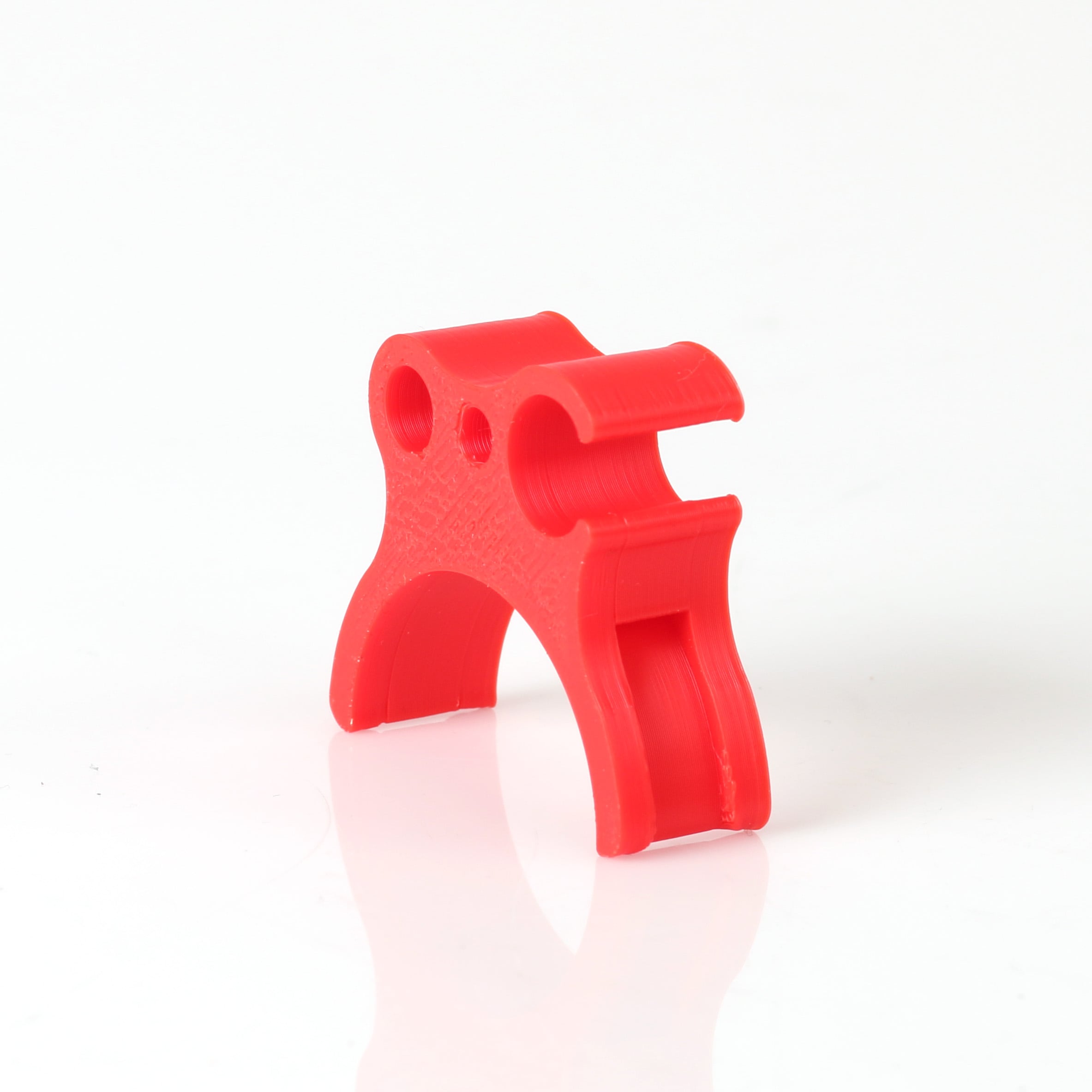 Holder for fuel hose and throttle cable red