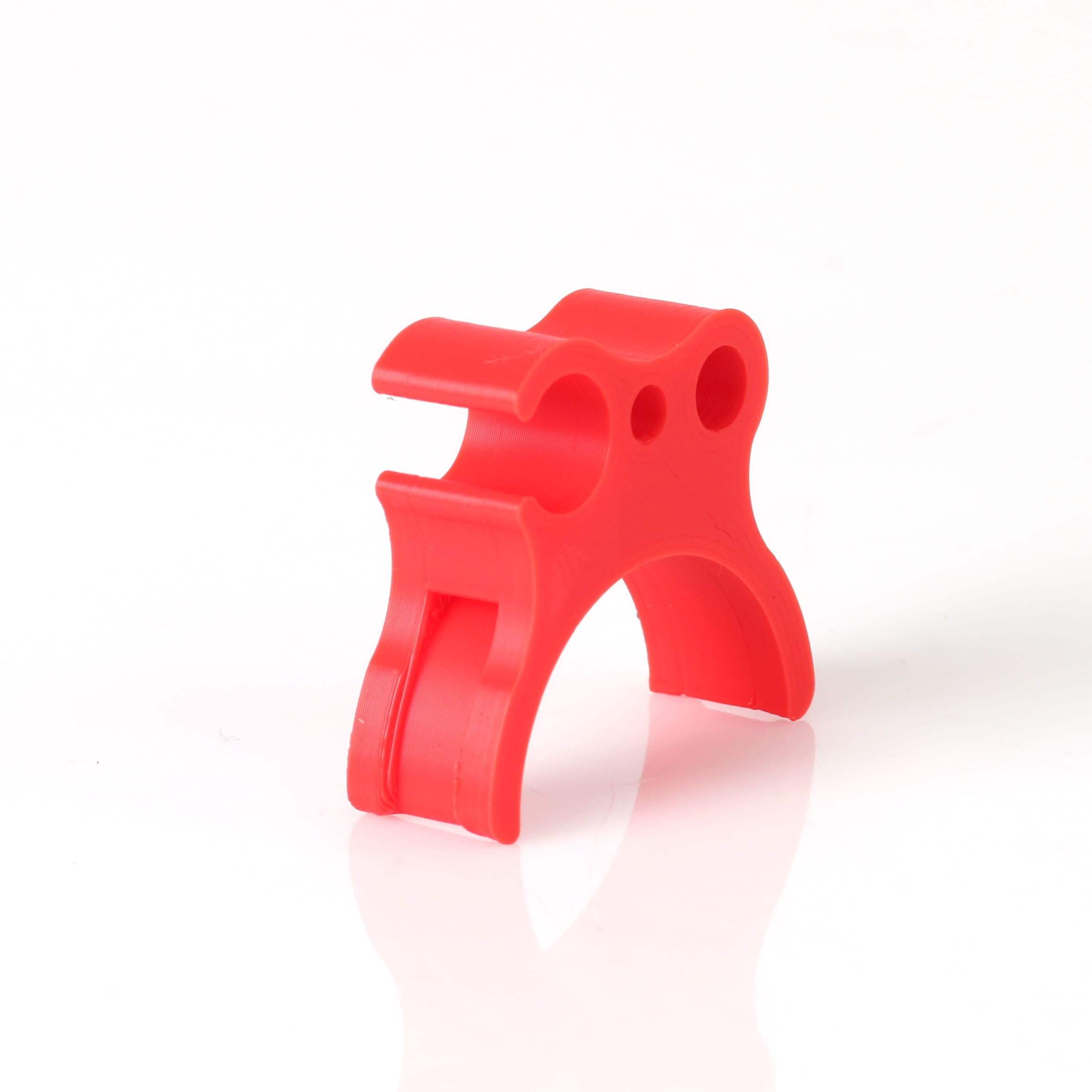 Holder for fuel hose and throttle cable red